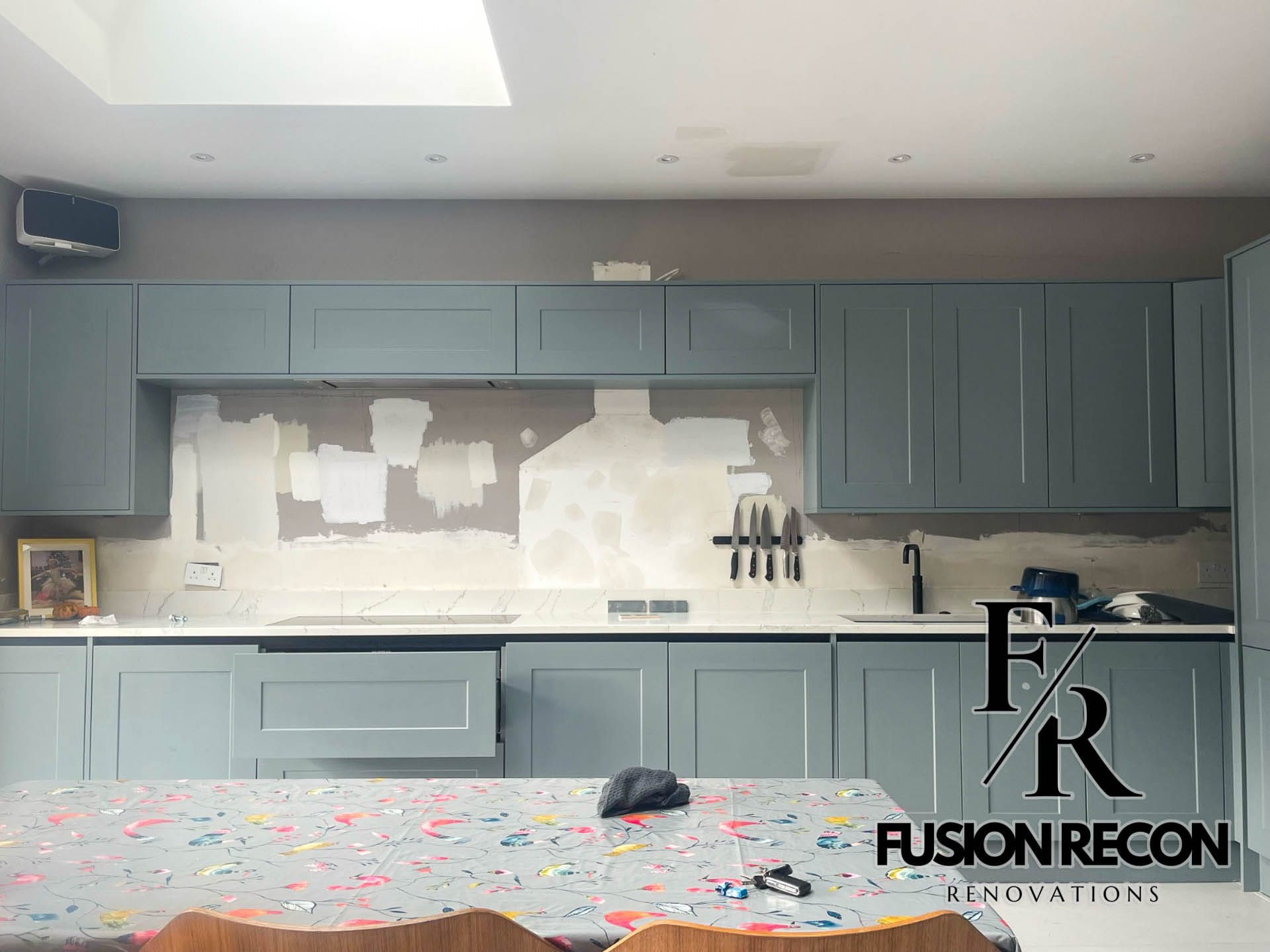 Fully integrated modern kitchen with bespoke cabinetry and built-in appliances – Wimbledon SW19