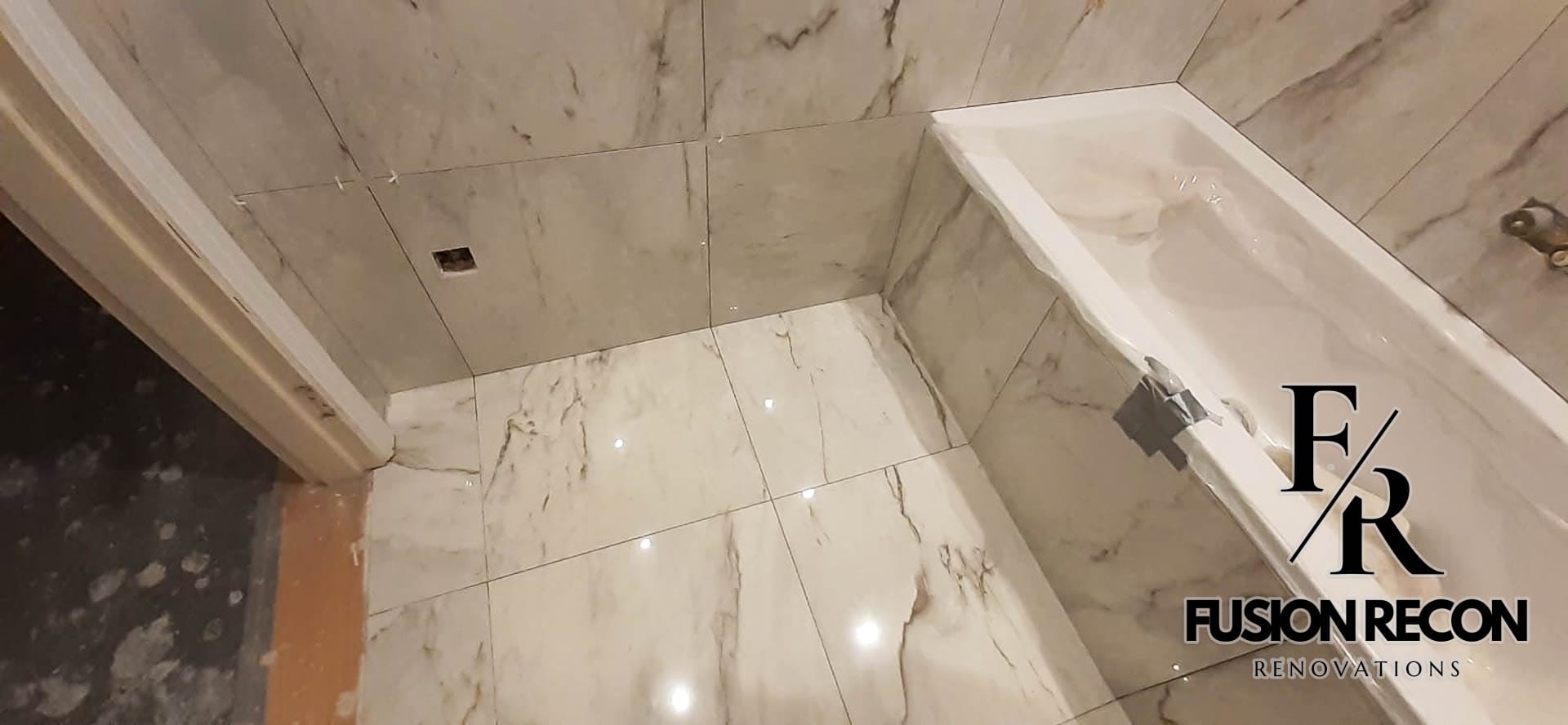 Marble tiles bathroom renovation with modern fixtures – Camden NW1