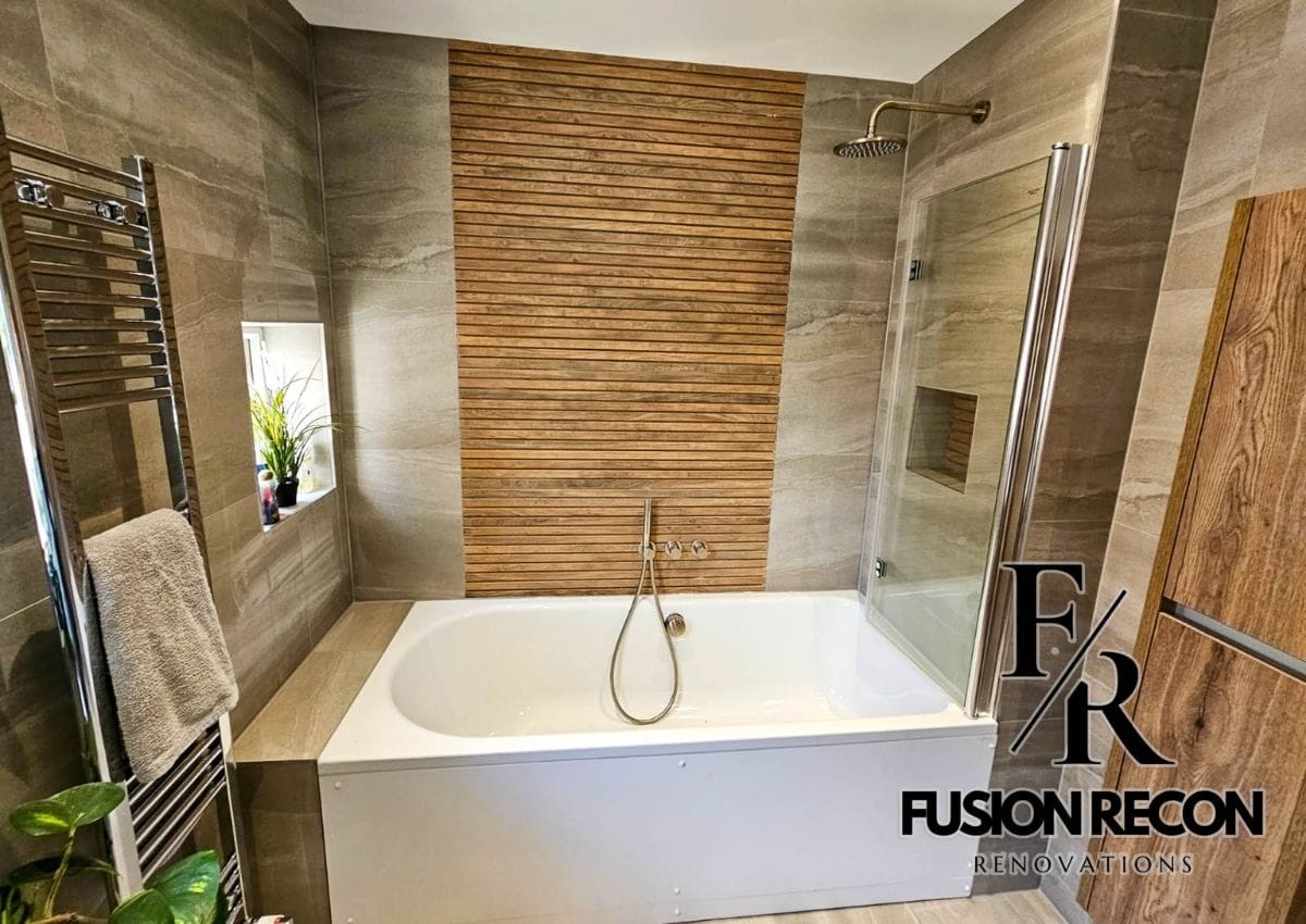 Luxury bathroom makeover in South Kensington SW7 featuring elegant tiling, high-end fittings, and a sleek modern design.