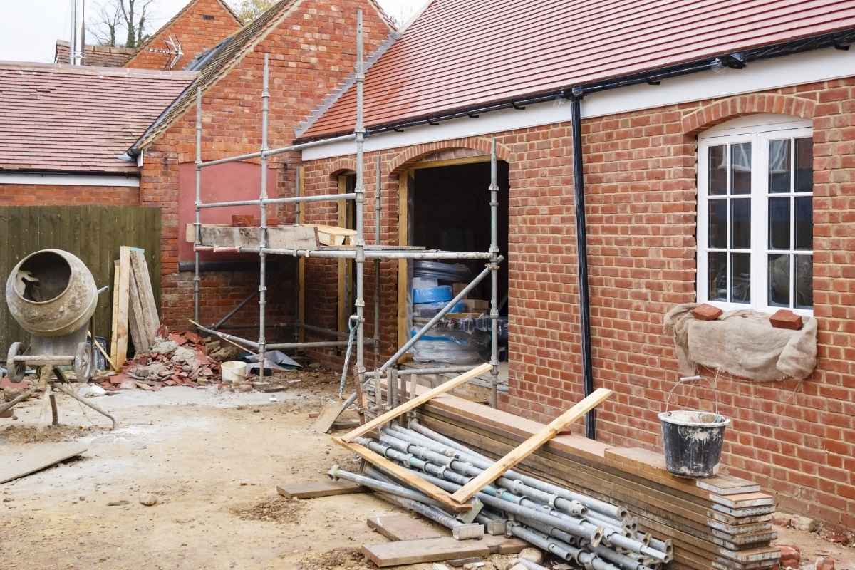 Living room renovation with new flooring, painting and modern layout